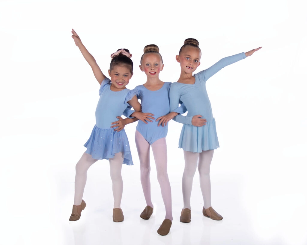3 kids in an blue light blue dance suit